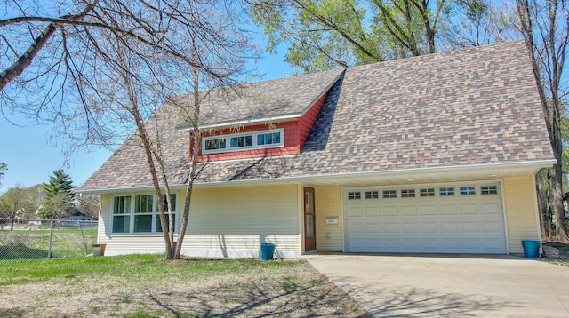 1431 Beech St, Saint Paul, MN 55106 - view of front of house with concrete driveway, an attached garage, and roof with shingles