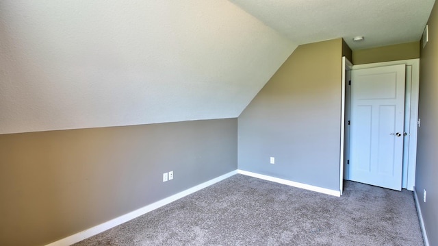 1431 Beech St, Saint Paul, MN 55106 - bonus room featuring carpet, lofted ceiling, and baseboards