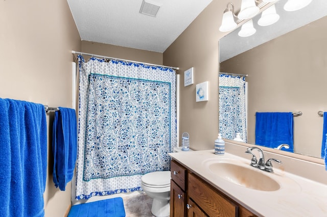 bathroom featuring tile patterned flooring, vanity, toilet, curtained shower, and visible vents