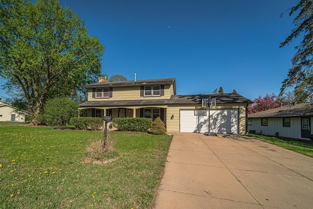 traditional-style home featuring an attached garage, driveway, a chimney, and a front yard