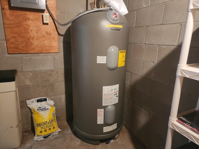 utility room with water heater