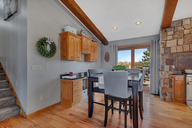 10283 Ferry Point Pl NW, Rice, MN 56367 - dining area featuring stairway, baseboards, lofted ceiling with beams, light wood-style floors, and recessed lighting