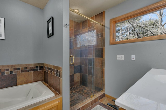10283 Ferry Point Pl NW, Rice, MN 56367 - full bath with plenty of natural light, a garden tub, baseboards, and a stall shower