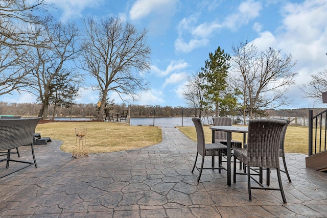 10283 Ferry Point Pl NW, Rice, MN 56367 - view of patio featuring a water view and outdoor dining space