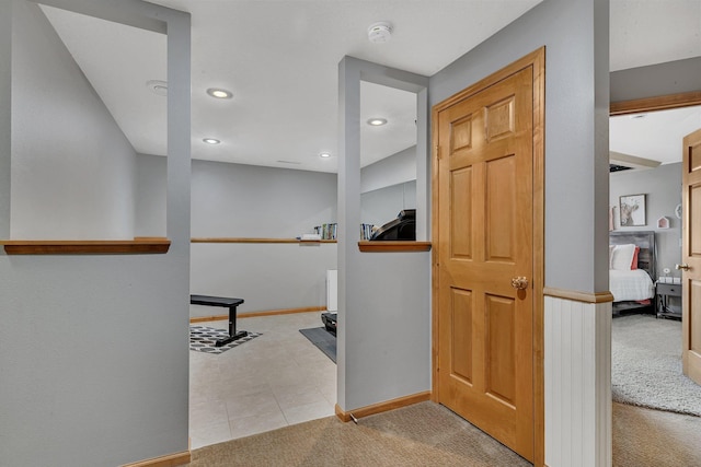 10283 Ferry Point Pl NW, Rice, MN 56367 - hall with baseboards, light carpet, and recessed lighting