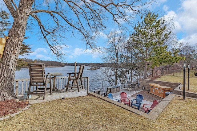 10283 Ferry Point Pl NW, Rice, MN 56367 - dock area featuring a lawn, a water view, fence, and a patio