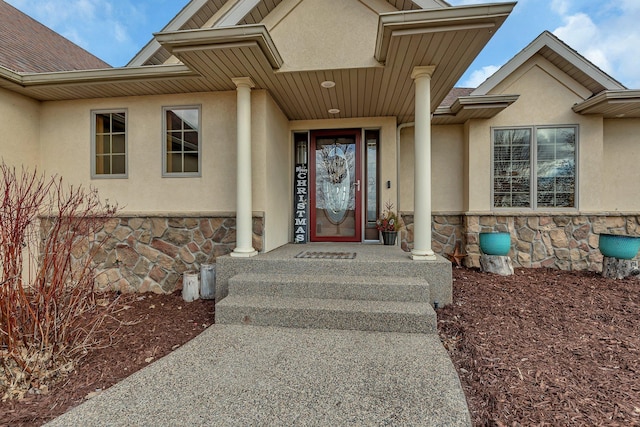 10283 Ferry Point Pl NW, Rice, MN 56367 - view of exterior entry featuring stucco siding and stone siding