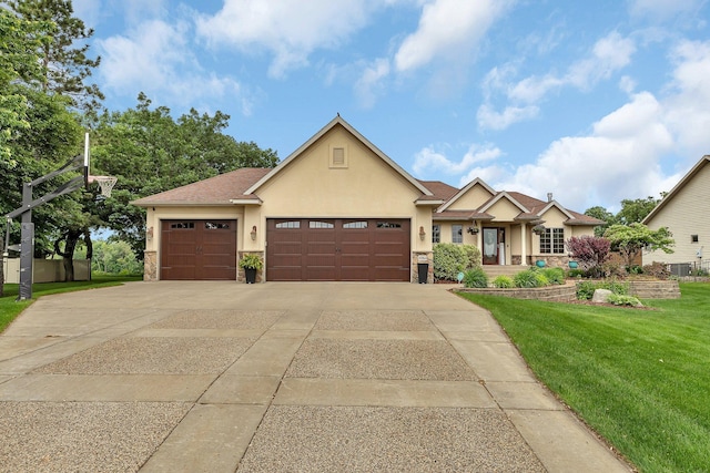 10283 Ferry Point Pl NW, Rice, MN 56367 - view of front facade featuring stucco siding, a front lawn, an attached garage, driveway, and stone siding