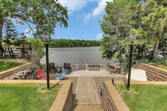 10283 Ferry Point Pl NW, Rice, MN 56367 - view of patio featuring a deck with water view