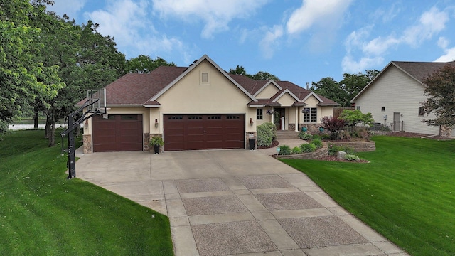 10283 Ferry Point Pl NW, Rice, MN 56367 - view of front of property featuring stucco siding, a front lawn, a garage, and driveway