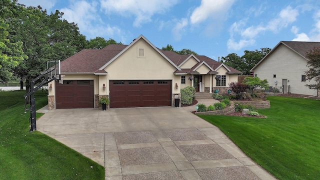 10283 Ferry Point Pl NW, Rice, MN 56367 - view of front of property featuring stucco siding, a garage, a front lawn, and stone siding