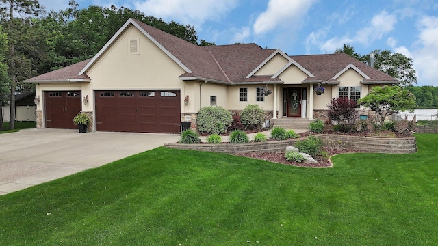 10283 Ferry Point Pl NW, Rice, MN 56367 - view of front of home featuring stucco siding, a front lawn, stone siding, a garage, and concrete driveway
