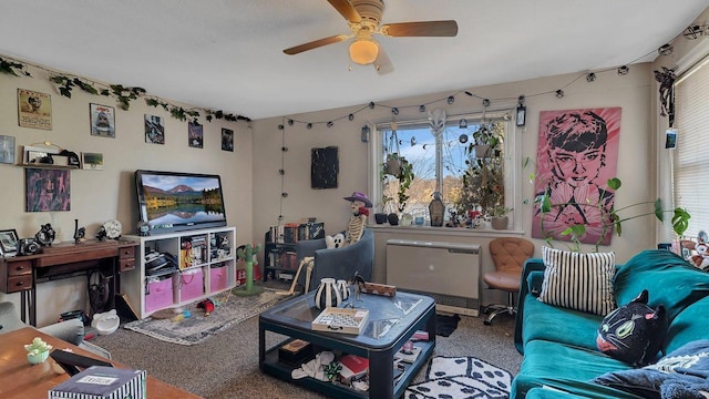 carpeted living area featuring a ceiling fan and heating unit