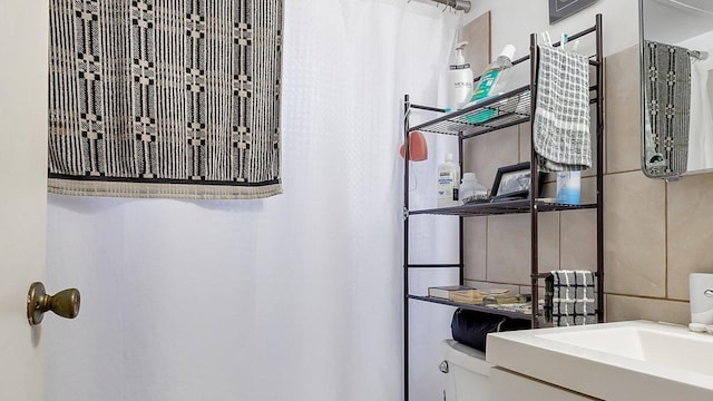 bathroom featuring a sink and toilet