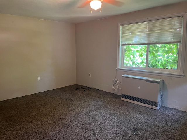 629 5th Ave N, Saint Cloud, MN 56303 - carpeted spare room with heating unit and ceiling fan