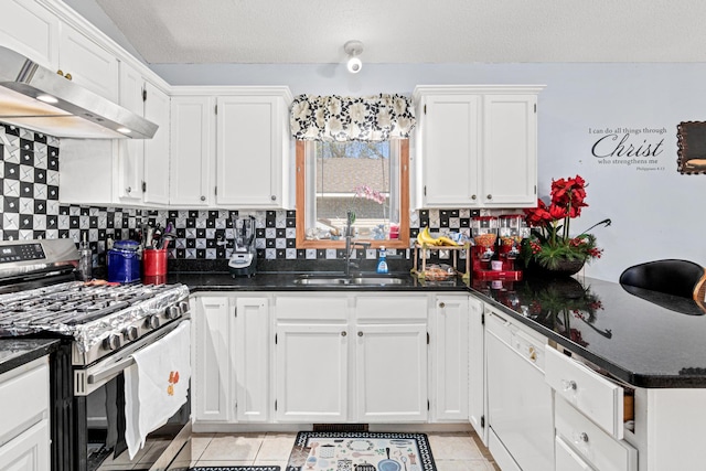 kitchen with white cabinets, white dishwasher, a sink, stainless steel range with gas stovetop, and under cabinet range hood