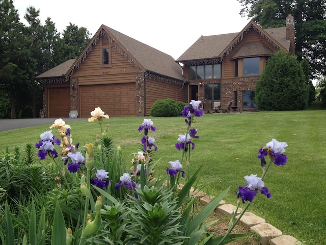 5795 Otter Lake Rd, White Bear Twp, MN 55110 - view of property's community with an attached garage, a yard, and driveway