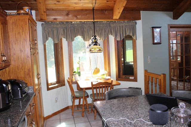 5795 Otter Lake Rd, White Bear Twp, MN 55110 - dining room with a wooden ceiling with exposed beams and light tile patterned flooring