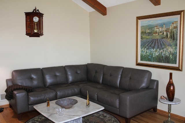 5795 Otter Lake Rd, White Bear Twp, MN 55110 - living area with beamed ceiling and wood finished floors