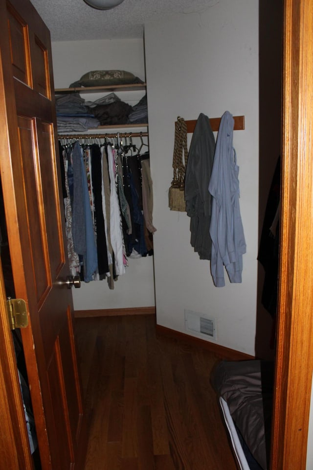 5795 Otter Lake Rd, White Bear Twp, MN 55110 - walk in closet with wood finished floors