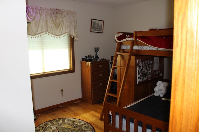 5795 Otter Lake Rd, White Bear Twp, MN 55110 - bedroom featuring wood finished floors and baseboards