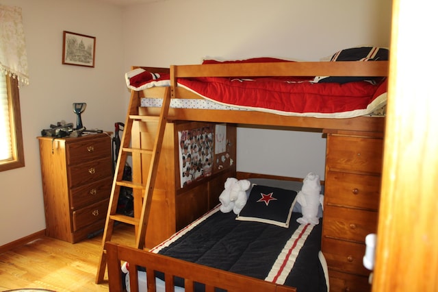 5795 Otter Lake Rd, White Bear Twp, MN 55110 - bedroom featuring wood finished floors and baseboards