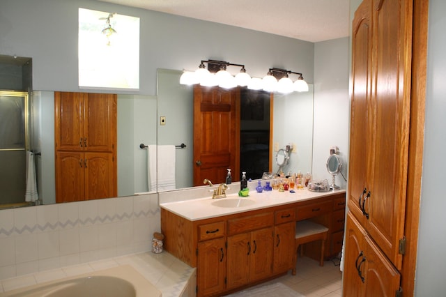 5795 Otter Lake Rd, White Bear Twp, MN 55110 - full bath with a bath, vanity, a shower with shower door, and tile patterned flooring