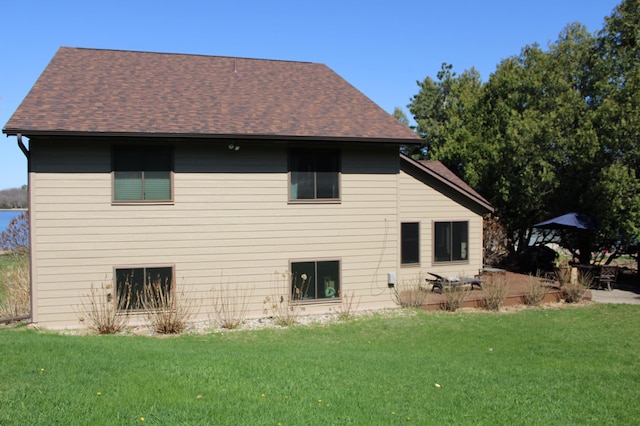 5795 Otter Lake Rd, White Bear Twp, MN 55110 - rear view of property with a patio area, a yard, and a shingled roof