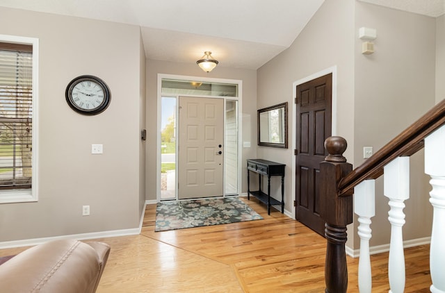 1006 9th Street Ct SE, New Prague, MN 56071 - entrance foyer featuring light wood-style flooring and baseboards