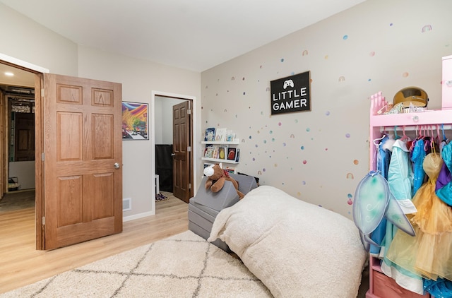 1006 9th Street Ct SE, New Prague, MN 56071 - bedroom with light wood-type flooring