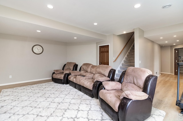 1006 9th Street Ct SE, New Prague, MN 56071 - living area with stairway, light wood-type flooring, recessed lighting, and baseboards