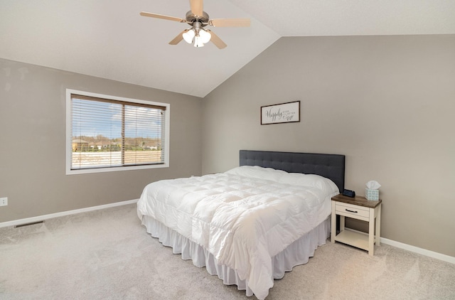 1006 9th Street Ct SE, New Prague, MN 56071 - bedroom featuring vaulted ceiling, light carpet, baseboards, and a ceiling fan
