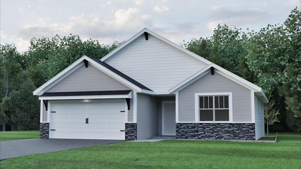 view of front of property with an attached garage, stone siding, a front yard, and driveway