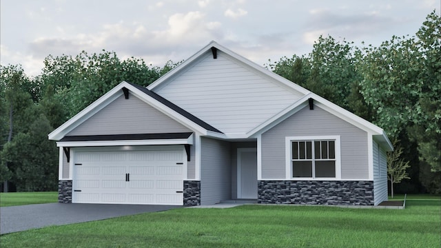 view of front of property with an attached garage, stone siding, a front yard, and driveway