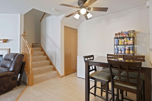 5085 149th St N # 3, Hugo, MN 55038 - dining space with a ceiling fan, stairway, and a textured ceiling