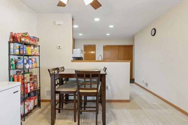 5085 149th St N # 3, Hugo, MN 55038 - dining room with baseboards, ceiling fan, and recessed lighting