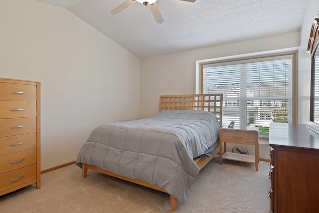 5085 149th St N # 3, Hugo, MN 55038 - bedroom with lofted ceiling, light colored carpet, baseboards, and ceiling fan