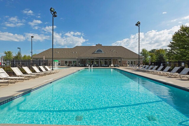 5085 149th St N # 3, Hugo, MN 55038 - community pool with a patio area and fence