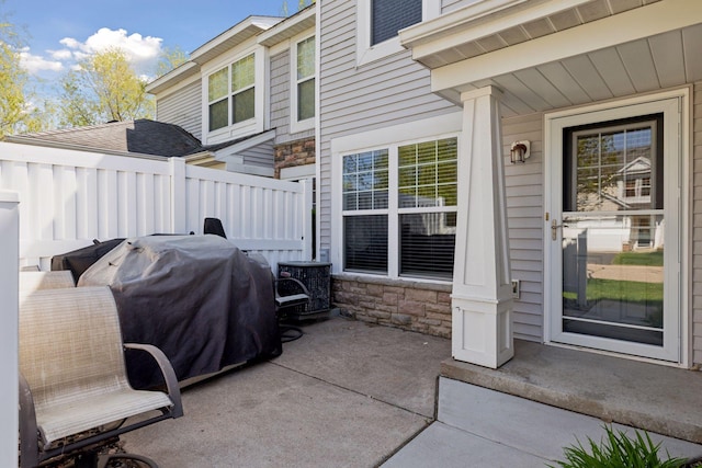 5085 149th St N # 3, Hugo, MN 55038 - view of patio with grilling area, fence, and central AC