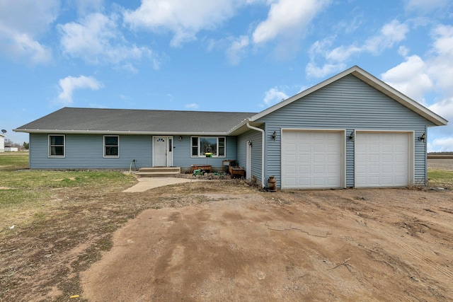 single story home with an attached garage