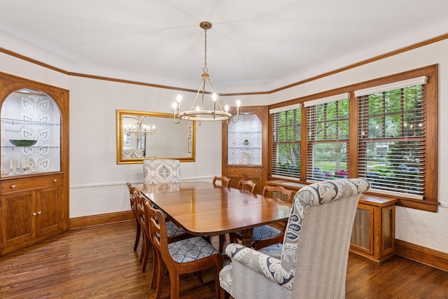 1722 Pinehurst Ave, Saint Paul, MN 55116 - dining room with a chandelier, dark wood finished floors, baseboards, and ornamental molding