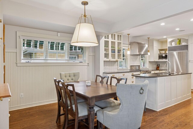 1722 Pinehurst Ave, Saint Paul, MN 55116 - dining space featuring dark wood-style flooring, plenty of natural light, wainscoting, and recessed lighting