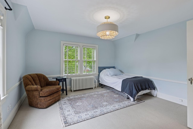 1722 Pinehurst Ave, Saint Paul, MN 55116 - carpeted bedroom featuring radiator and a chandelier