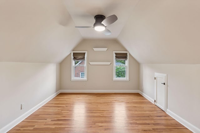 1722 Pinehurst Ave, Saint Paul, MN 55116 - bonus room featuring light wood-style floors, baseboards, ceiling fan, and vaulted ceiling