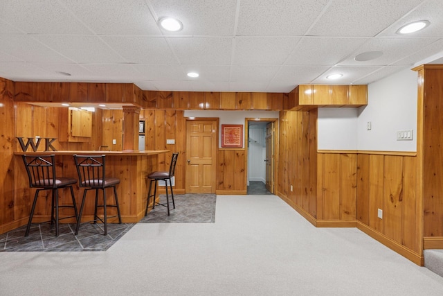 1722 Pinehurst Ave, Saint Paul, MN 55116 - indoor bar with carpet floors, wood walls, recessed lighting, and baseboards