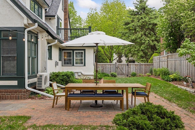 1722 Pinehurst Ave, Saint Paul, MN 55116 - view of patio / terrace with outdoor dining area and a cooling unit