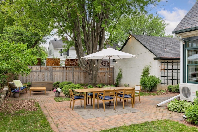 1722 Pinehurst Ave, Saint Paul, MN 55116 - view of patio with fence, a cooling unit, and outdoor dining space