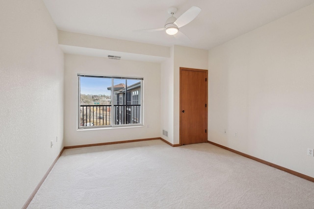 7100 Metro Blvd Unit 401, Edina, MN 55439 - empty room featuring visible vents, baseboards, ceiling fan, and light colored carpet