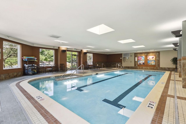 7100 Metro Blvd Unit 401, Edina, MN 55439 - pool featuring a skylight