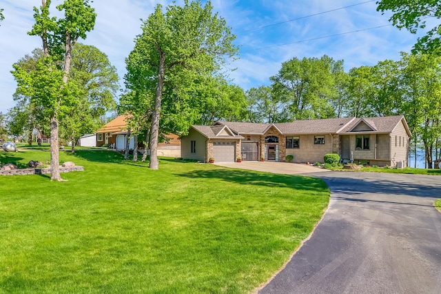 21005 County Highway 32, Rochert, MN 56578 - ranch-style house featuring an attached garage, driveway, and a front lawn